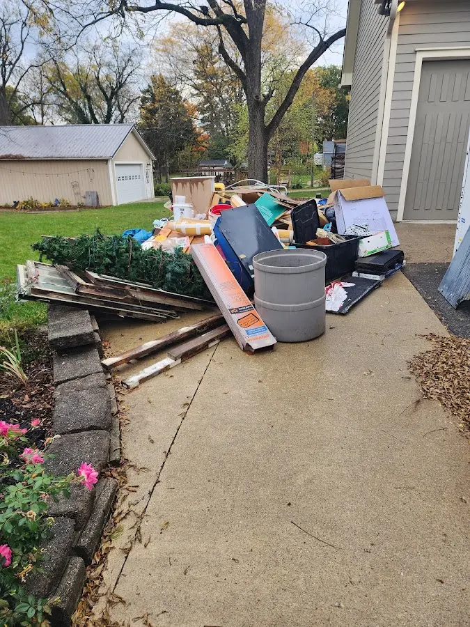 Dumpster being loaded with debris for 3 Yard Dumpster Rental in Carpinteria